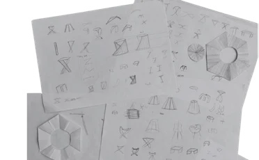 Pencil ideation sketches of stool forms